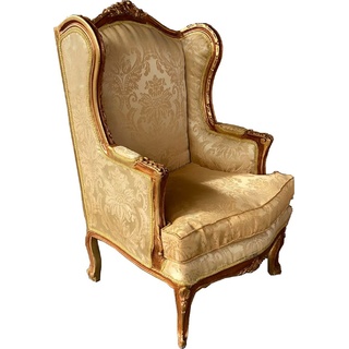 Casa Padrino Barock Ohrensessel Cremefarben / Braun / Gold - Handgefertigter Antik Stil Wohnzimmer Sessel mit elegantem Muster - Barock Wohnzimmer Möbel