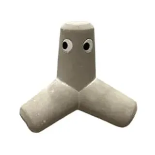 SL. Geschenke Beton-Tetrapod – Mini-Deko im maritimen Küstenlook, 8,5x8,5 cm, grau mit Augen