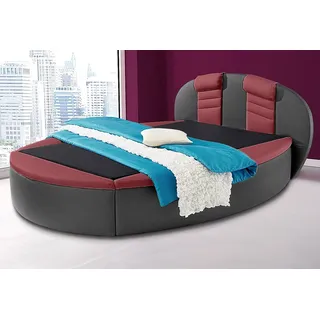 Rundbett, bunt (schwarz, bordeauxrot), B:180cm L:230cm, Bezug Bett: Kunstleder;Bonnell-Federkernmatratze: 51% Polypropylen, 39% Polyester, 10% Baumwolle;Kaltschaummatratze: 100% Polyester, Bezug abnehm- und waschbar bis 60C, WESTFALIA SCHLAFKOMFORT, Betten, mit Bettkasten