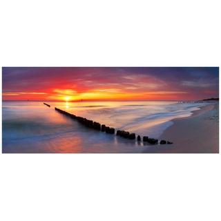 Wallario Glasbild, Farbenspiel im Himmel - Sonnenuntergang am Strand, in verschiedenen Ausführungen rot