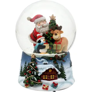Dekohelden24 Schneekugel - Santa mit Rentier und Pinguin - auf blauem Sockel mit Weihnachtliche Winterlandschaft und Spielwerk, Melodie: White Christmas, Maße H/B/Ø Kugel: 14,5 x 10,5 cm Ø 10 cm.