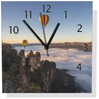 Wallario Wanduhr Ballons über Nebelmeer (Aluverbunduhr) gelb
