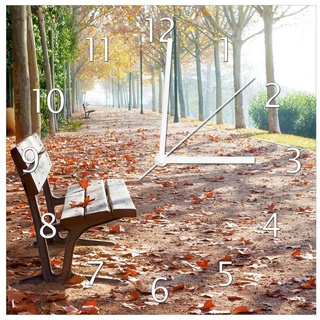 Wallario Wanduhr Einsame Parkbank an einer Allee - Herbststimmung (Glasuhr) 30 cm x 30 cm