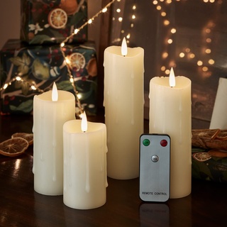 Lights4fun 4er Set TruGlow® LED Echtwachskerzen mit Fernbedienung und Timer Kerzen mit Wachstropfen batteriebetrieb