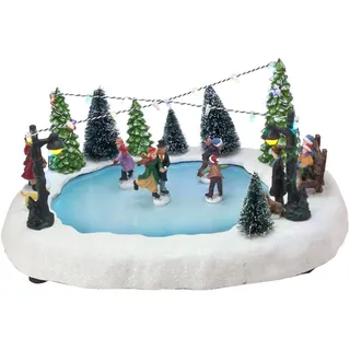 Spetebo LED Weihnachtszene - Eisbahn mit fahrenden Figuren - Tischdekoration Weihnachtsdeko beleuchtet
