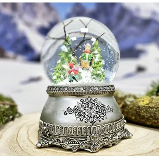 Schneekugel Skifahrer mit Musik | Schifahrer im Winterwald | Sockel Zinnoptik | 100mm breit, 140mm hoch | mechanische Spieluhr | Weihnachtsdekoration | 20268