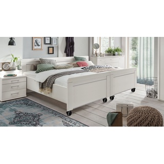 Weißes Doppelbett in Komforthöhe mit Rollen 180x200 cm - Calimera