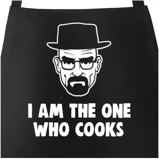 MoonWorks Grillschürze Grill-Schürze für Männer mit Spruch I am the one who cooks Baumwoll-Schürze Küchenschürze Moonworks®, mit kreativem Aufdruck schwarz