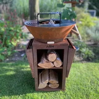 ASH Phoenix Plancha BBQ - Cortenstahl - XXL Außenküche mit Grillring, Klappbare Seitentische & Holzaufbewahrung - Ø60cm - Feuerschale - Holz & Holzkohle - Rostoptik