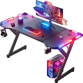 HLONONE Gaming Tisch mit LED, Gaming Schreibtisch 140 x 60 cm, Schwarz | Kopfhörerhaken, Getränkehalter, 2 Kabeltüllen, 4x4-RGB Immersive Gaming-Atmosphäre, Kohlefaseroberfläche, für Gaming und Büro