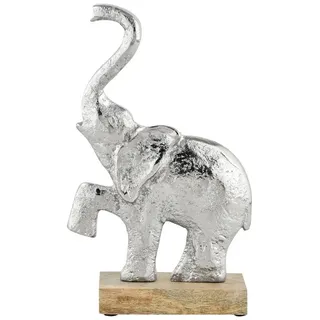 Marrakesch Orient & Mediterran Interior Dekofigur Mumba aus Aluminium, im modernen Design, in Silber 21 cm | Die von Hand gefertigte Dekofigur Elefant kombiniert massives Aluminium in edlem Silber-Finish mit einem stabilen Holzsockel.