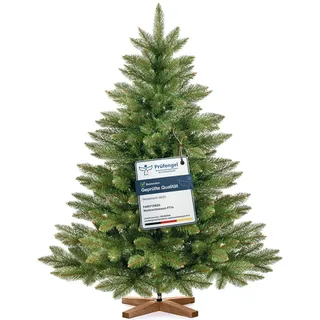 FairyTrees Weihnachtsbaum künstlich 120cm NORDMANNTANNE mit Christbaum Holzständer | Tannenbaum künstlich mit grünem Stamm | EU - Grün