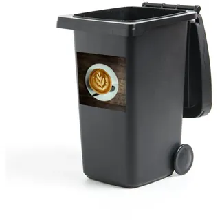 MuchoWow Wandsticker Luftaufnahme einer Blume, die in einer Tasse Cappuccino geformt wurde (1 St), Mülleimer-aufkleber, Mülltonne, Sticker, Container, Abfalbehälter bunt