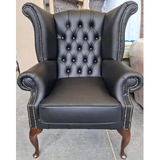 Casa Padrino Luxus Chesterfield Ohrensessel Schwarz / Dunkelbraun 98 x 90 x H. 110 cm - Echtleder Chesterfield Wohnzimmer Sessel - Wohnzimmer Möbel - Chesterfield Möbel - Luxus Leder Möbel